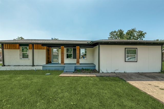 ranch-style house with a porch and a front yard