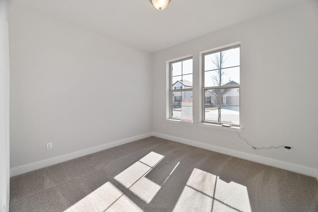 spare room with carpet floors