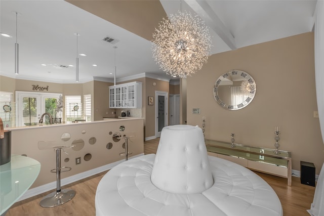 dining room with an inviting chandelier and hardwood / wood-style floors