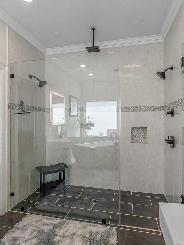 bathroom featuring tile patterned flooring, tile walls, a healthy amount of sunlight, and a tile shower