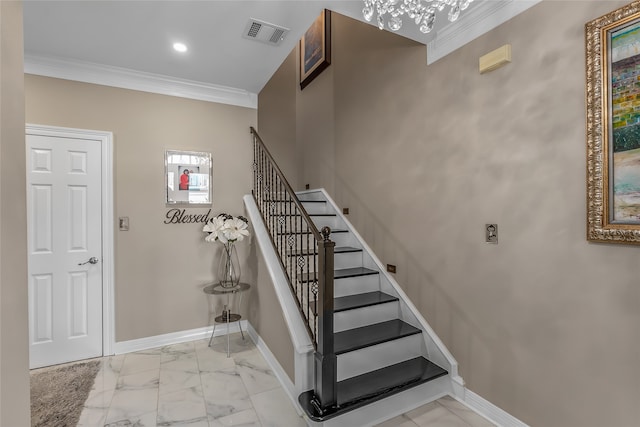 stairway featuring tile patterned floors, an inviting chandelier, and ornamental molding