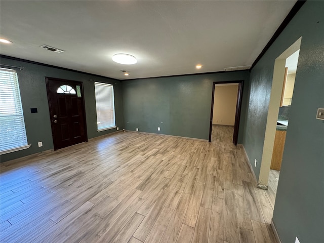 foyer with light wood-type flooring