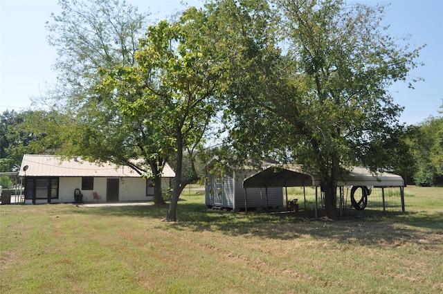 view of yard featuring a carport