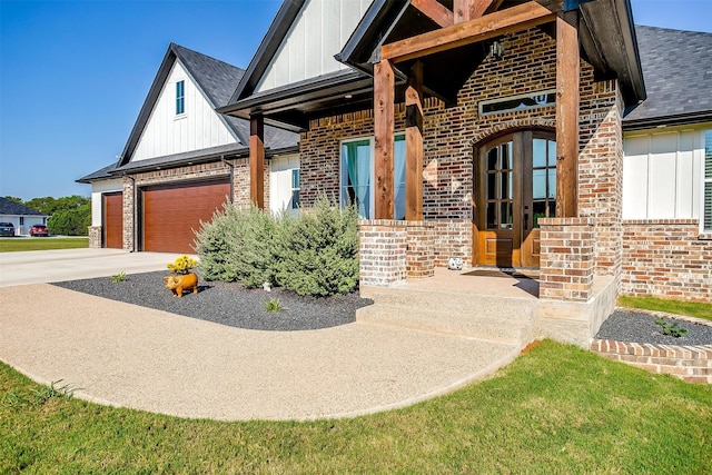 exterior space with french doors and a garage