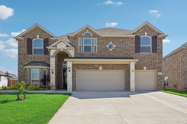 view of front facade featuring a garage and a front yard