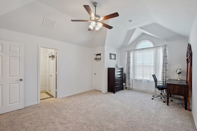 home office with ceiling fan, lofted ceiling, and light colored carpet