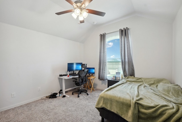 bedroom with ceiling fan, vaulted ceiling, and carpet