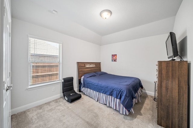 laundry room with washer and dryer and hardwood / wood-style flooring