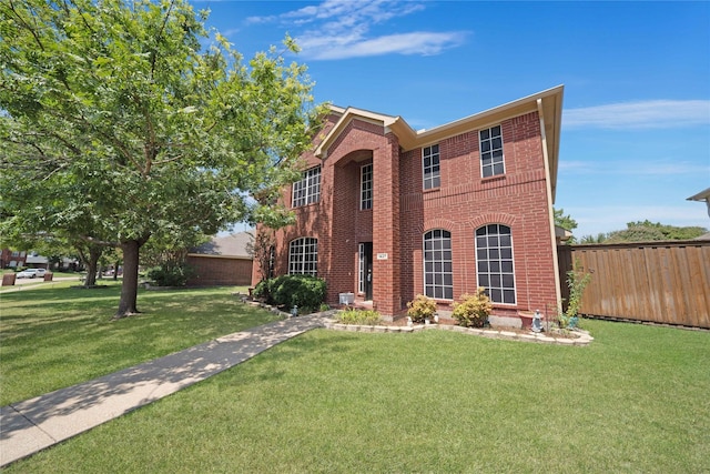 view of front facade featuring a front yard