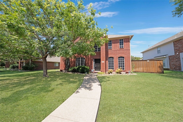 view of front facade with a front yard