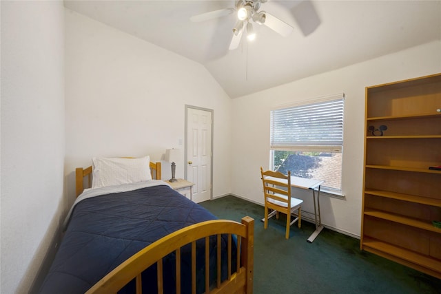 bedroom featuring dark carpet, ceiling fan, and vaulted ceiling