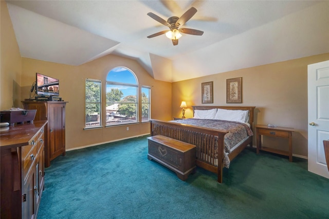 carpeted bedroom featuring vaulted ceiling and ceiling fan