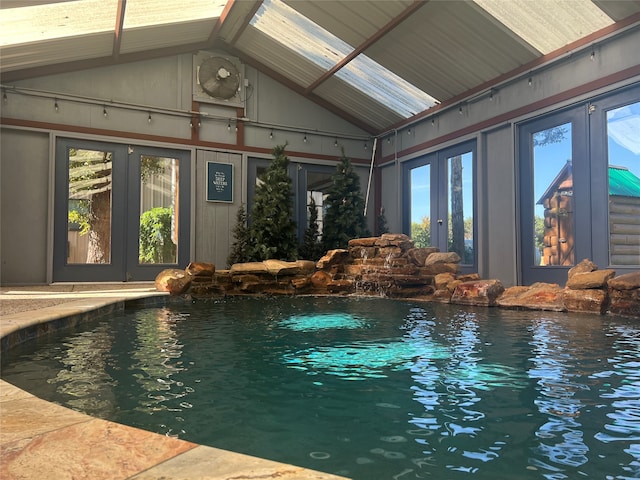 view of pool featuring french doors