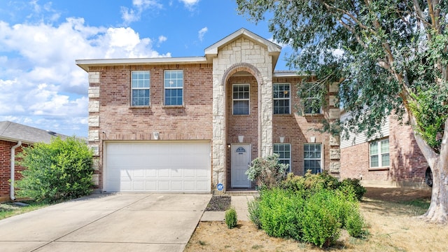 view of front of property with a garage