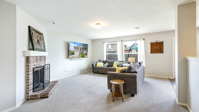 carpeted living room featuring a brick fireplace