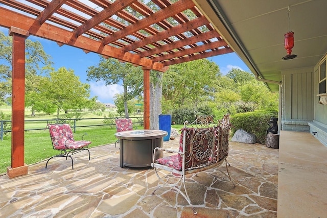 view of patio / terrace featuring a fire pit and a pergola