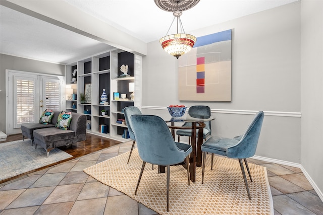 tiled dining room with french doors