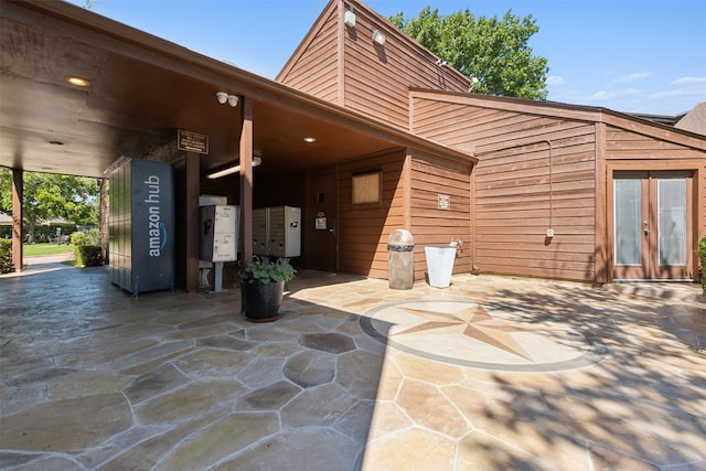 rear view of property featuring water heater