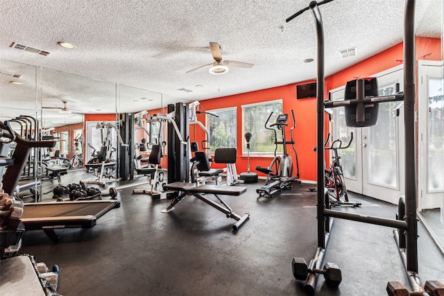 exercise room with ceiling fan, billiards, and a textured ceiling