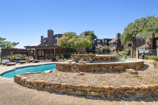 view of pool with a pergola