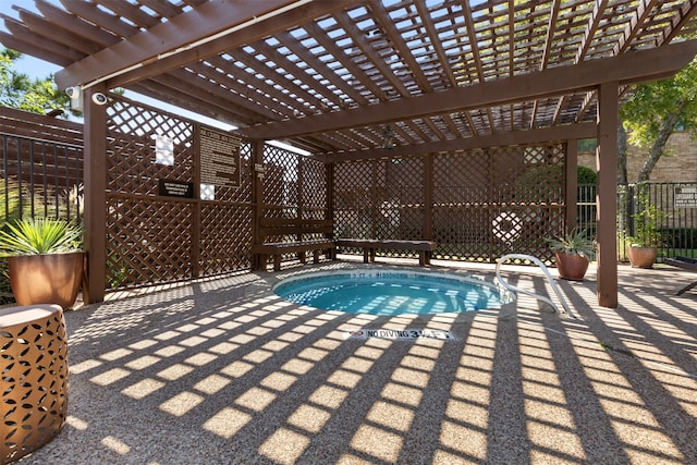 view of swimming pool featuring a pergola