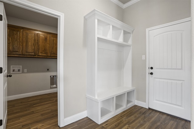 mudroom featuring dark wood-type flooring and ornamental molding