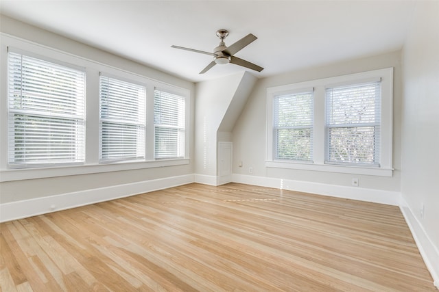 bonus room featuring ceiling fan and light hardwood / wood-style flooring