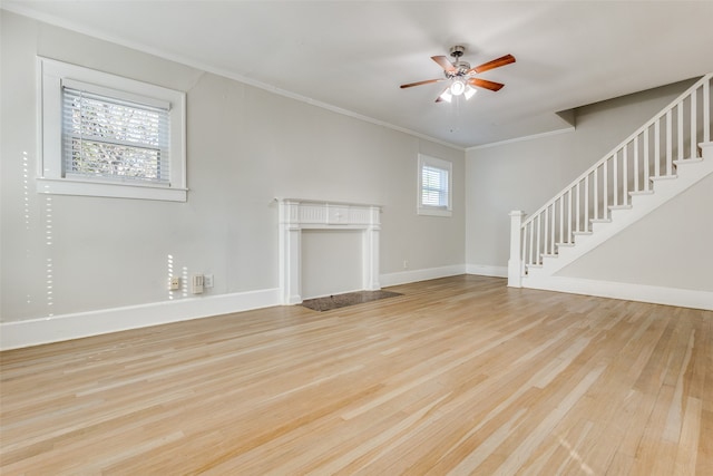 unfurnished living room featuring ceiling fan, light hardwood / wood-style flooring, and crown molding