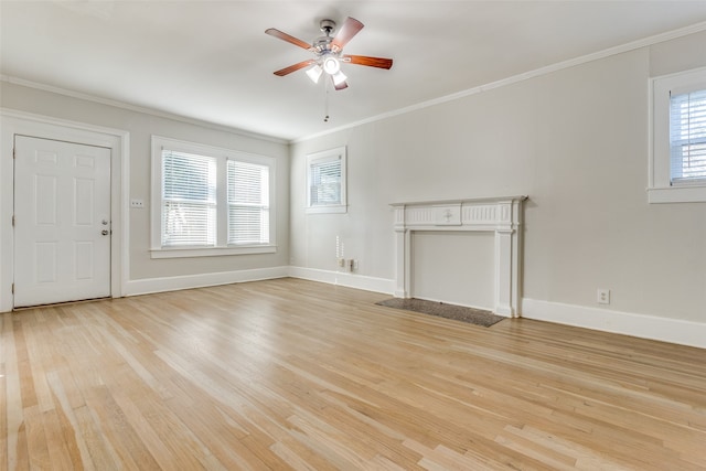 unfurnished living room with a wealth of natural light, ceiling fan, crown molding, and light wood-type flooring