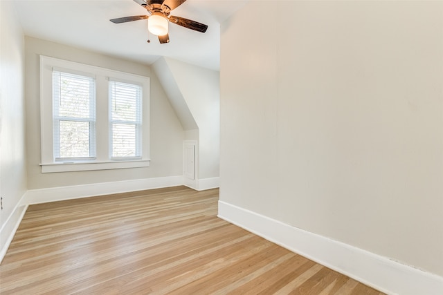 additional living space featuring light hardwood / wood-style floors and ceiling fan