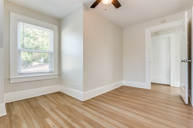 spare room with light hardwood / wood-style floors and ceiling fan