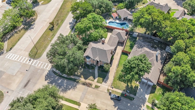 birds eye view of property with a residential view