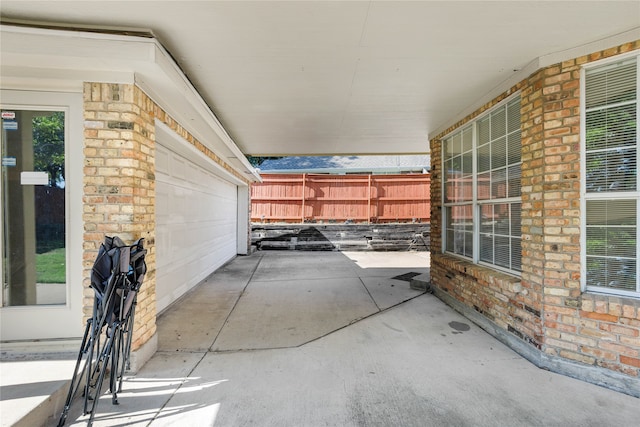 view of patio / terrace featuring fence