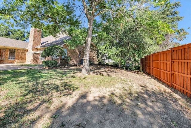 view of yard featuring a fenced backyard