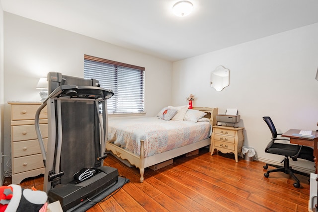 bedroom featuring hardwood / wood-style flooring