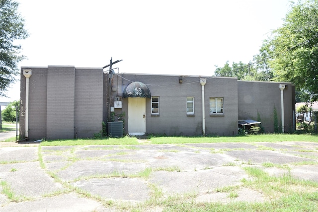 view of front facade with central AC unit