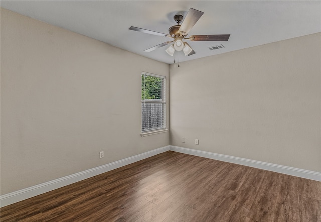 empty room with wood-type flooring and ceiling fan