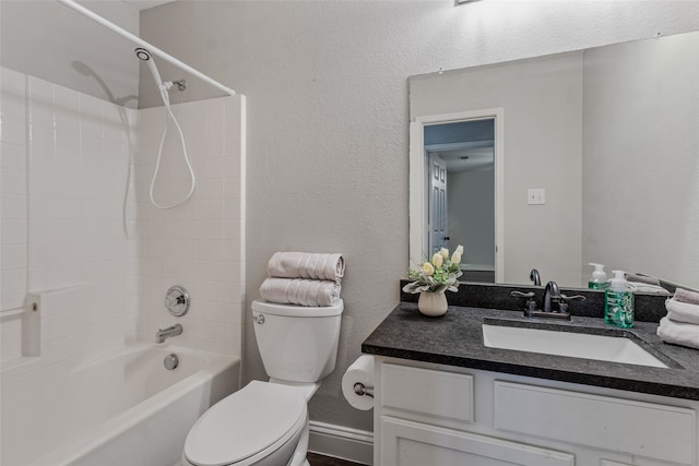 full bathroom featuring vanity, toilet, and shower / washtub combination