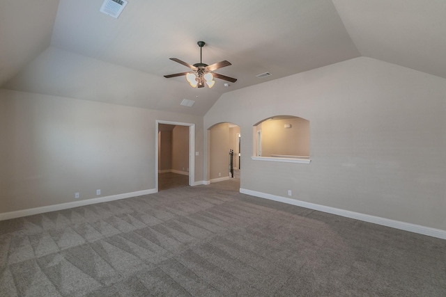 interior space featuring carpet floors, vaulted ceiling, and ceiling fan