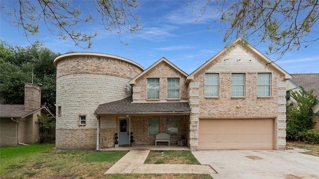 view of front of property featuring a garage