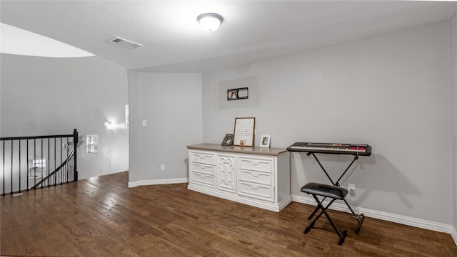 office area featuring dark wood-type flooring