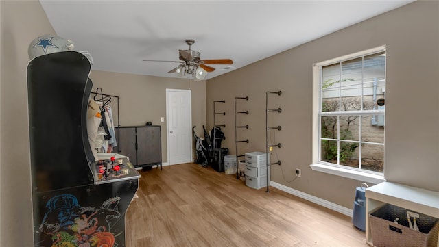 interior space featuring ceiling fan and light wood-type flooring