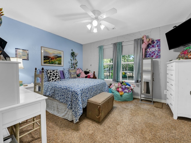 bedroom featuring ceiling fan and light carpet