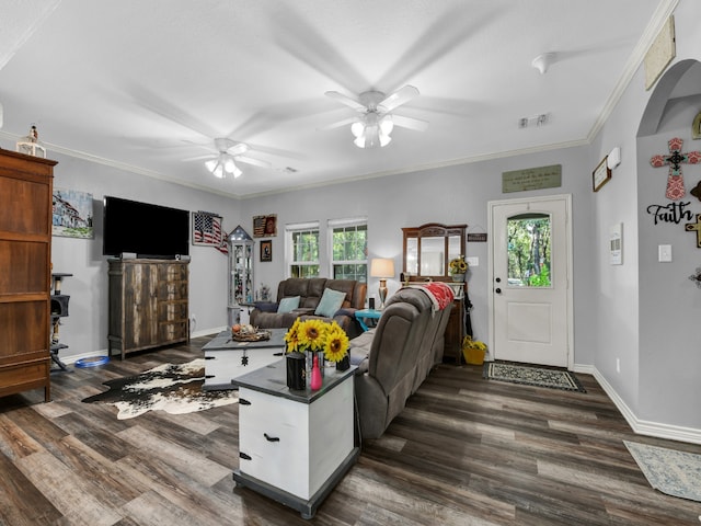 living room featuring ceiling fan, crown molding, and dark hardwood / wood-style floors