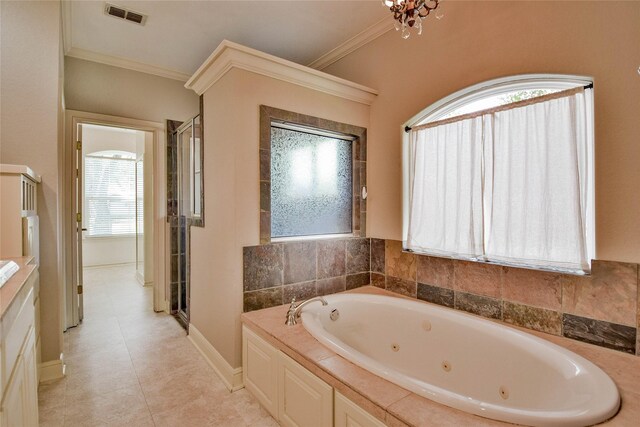 bathroom featuring tile patterned floors, plus walk in shower, crown molding, and vanity