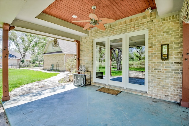 view of patio featuring ceiling fan