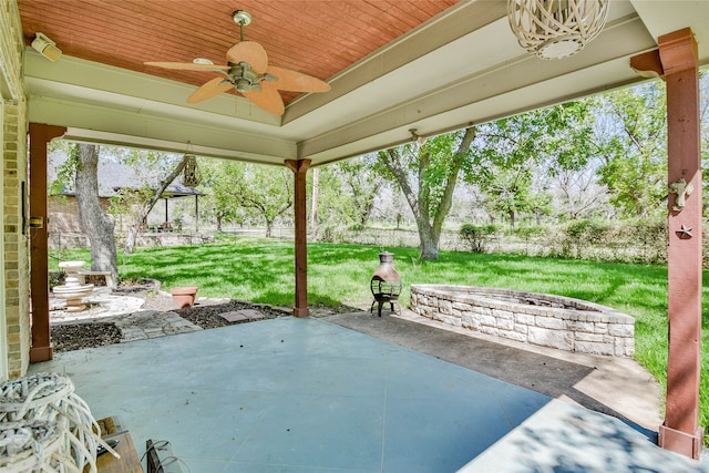 view of patio featuring ceiling fan