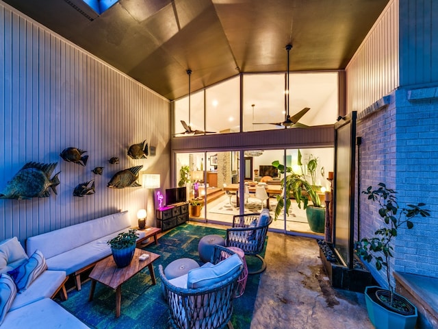 view of patio with an outdoor living space and ceiling fan