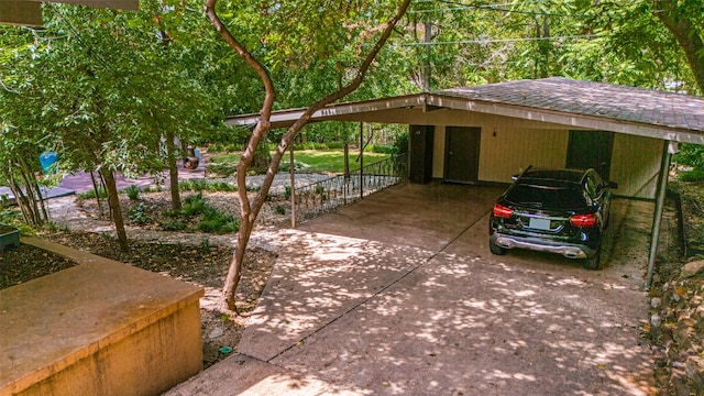 exterior space featuring a carport