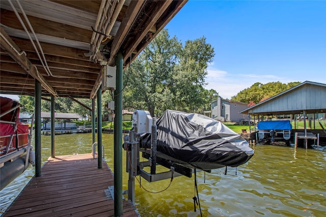 dock area featuring a water view